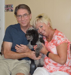 Popper with his new mom and dad!